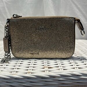 COACH clutch/wristlet. Metallic Bronze.